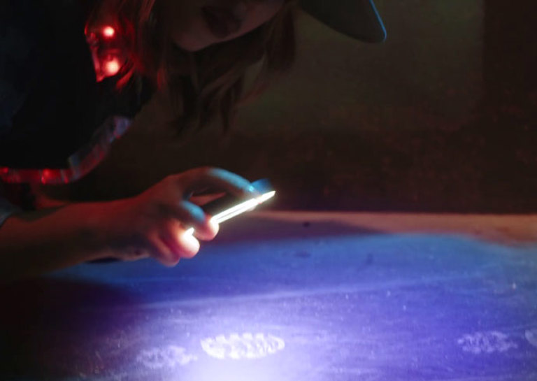 a video depicting a group of friends playing laser tag at Timezone