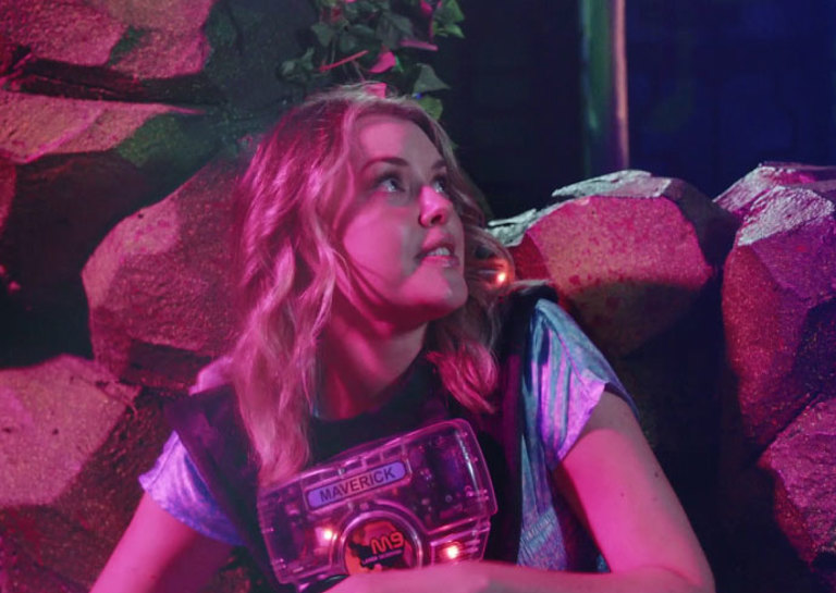 a video depicting a group of friends playing laser tag at Timezone