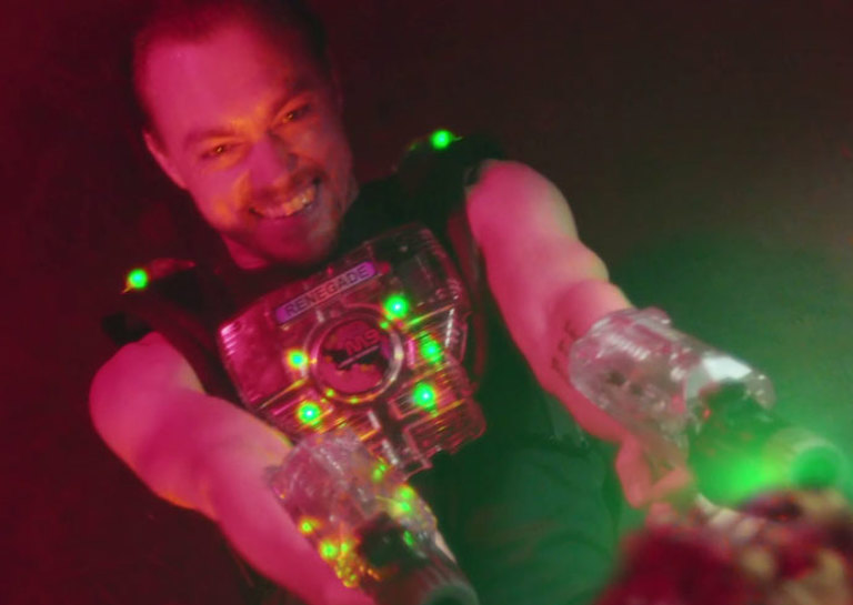 a video depicting a group of friends playing laser tag at Timezone